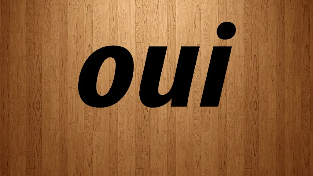 a sign on a wooden surface
